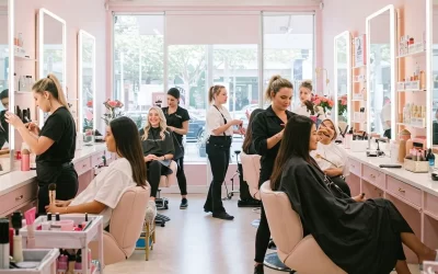 Students learning cosmetology and skincare treatments in Pune institute